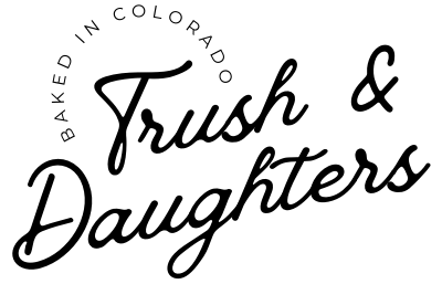 Trush & Daughters logo